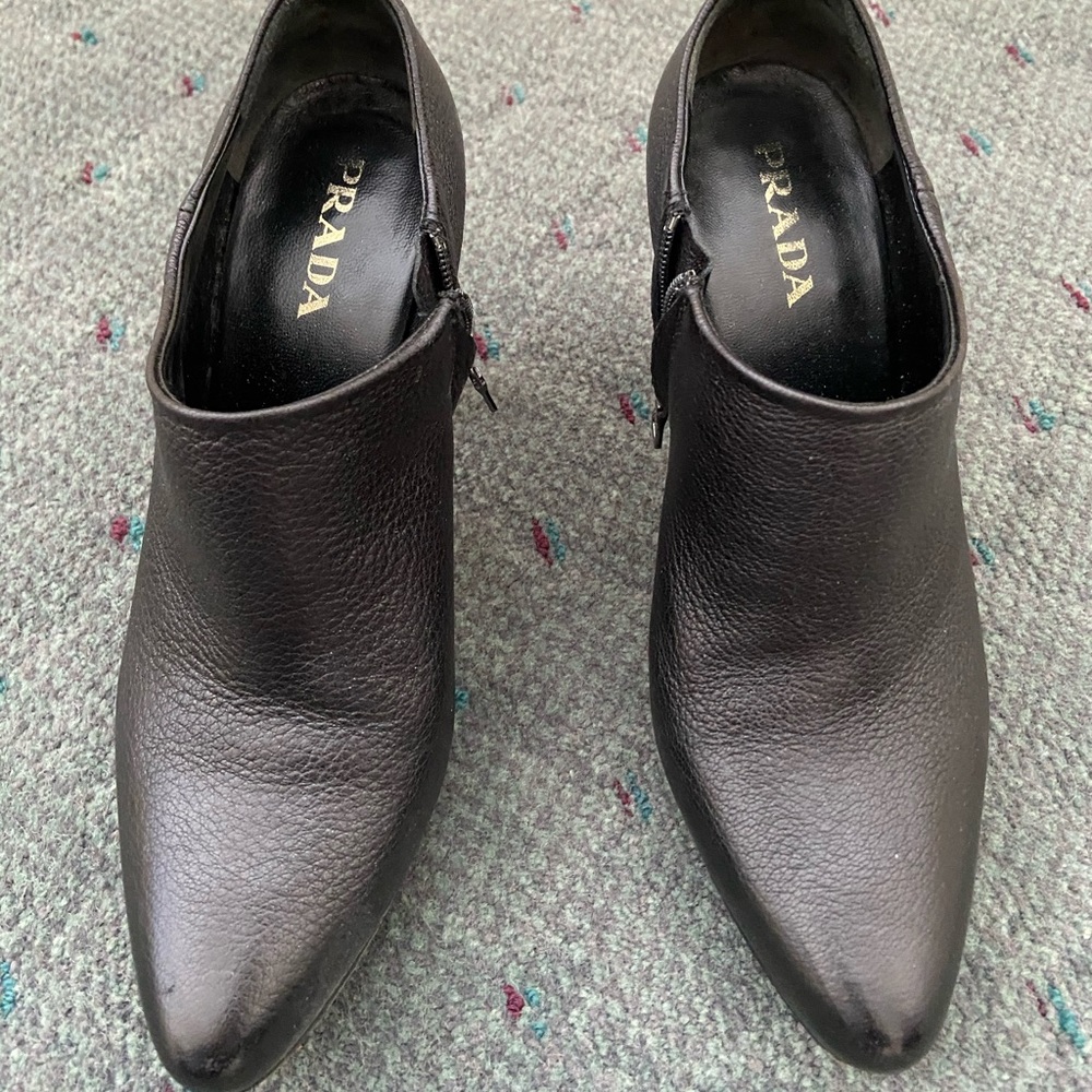 Prada black booties with a heel